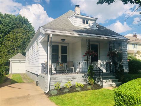 Utica House for Rent. Neilson St. - Property Id: 1285241 Nice 4 bedroom 1 bath home. Large living room and dining room with hardwood floors throughout. washer and dryer hook-ups right off kitchen. Off street parking. $1200.00 a month $1200.00 security deposit, utilities (gas, electric and water are separate). .