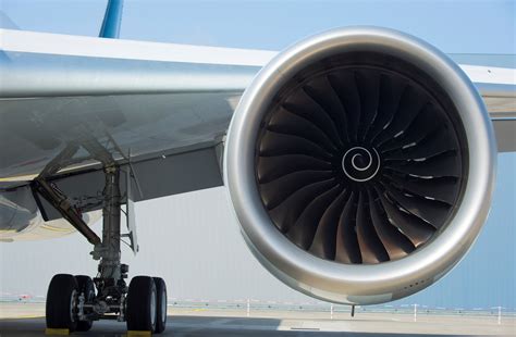 How are engines attached to plane wings