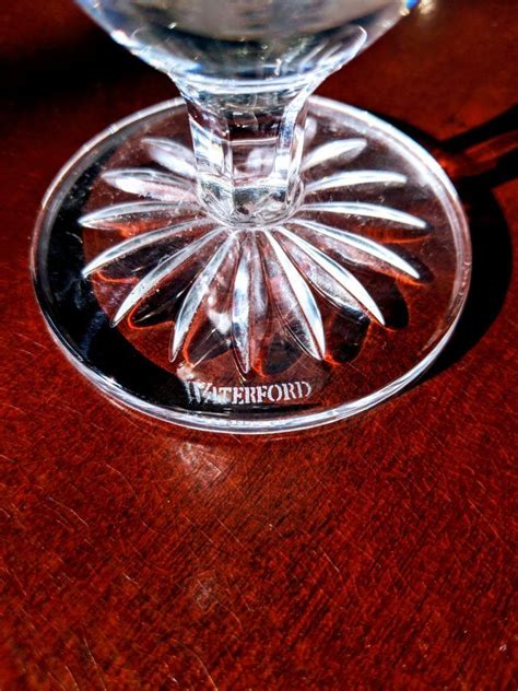 Crystal Stemware Manufacturer Marks . You could find the mark on the rim or center of the foot, on the stem, or on the bottom of the bowl.; The mark could be an initial, a logo, a word, or coded numbers and letters. Some marks are molded or embossed, others are stamped or etched on the glass (Waterford, for example).. 