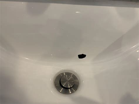 How do I fix this hole that appeared in my sink? : r/fixit - reddit