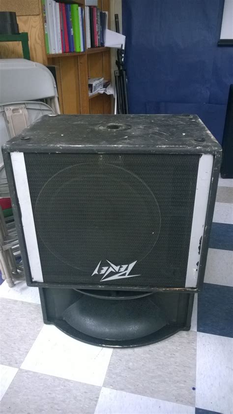 How do I remove the grill from an old Peavey cabinet?