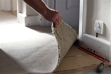 How do i pull up carpet. Use a contractor-grade trash bag to dispose of the carpet pad. Before removing the tack strips, put on hearing protection. Remove all of the tack strips with a flat prybar and hammer. If needed, place a 3-inch putty knife under the prybar to protect the stairs. Carefully put tack strip pieces into a contractor-grade bag. 
