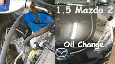 How do you change the oil filter on a Mazda 2? WapCar