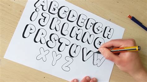 To draw bubble letters, start by writing the basic shapes of the letters you want. You can use either capital or lowercase letters. Next, draw an outline around each letter with rounded edges. To make this easier, try surrounding every line in the letter with an oval.