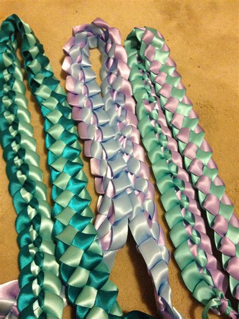 How do you make a ribbon lei. Easy-to-follow tutorial showing how to make a Double Braided Ribbon Lei in 3 colors.The lei requires about 6 yards of Red color, 6 yards of Blue color and... 