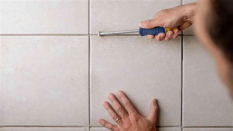 How easy is it to regrout tiles