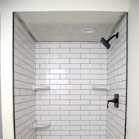How high should shower tile go