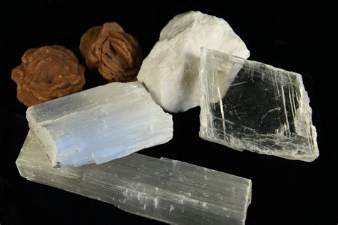 The chemical formula for gypsum is {eq}CaSO_4·H_2O {/eq}. As an evaporite, gypsum represents a crystal formed via precipitation, in which one water molecule is used per two calcium sulfate molecules.. 