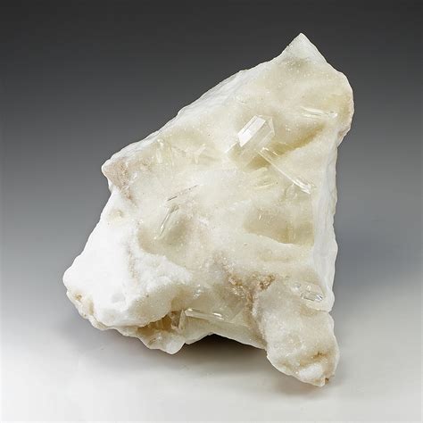 Gypsum is a mineral consisting of water-containing calcium sulphate (CaSO 4. 2 H 2 O). When calcined (roasted) at temperatures of 120-250°C, gypsum releases 75% of its water. The resulting plaster of Paris, when mixed with water, can be molded, shaped or spread, then dried or set to form hard plaster. Gypsum was used by the builders of the .... 