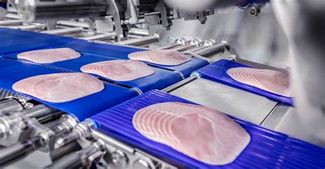 How is processed ham made