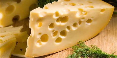 How is swiss cheese made
