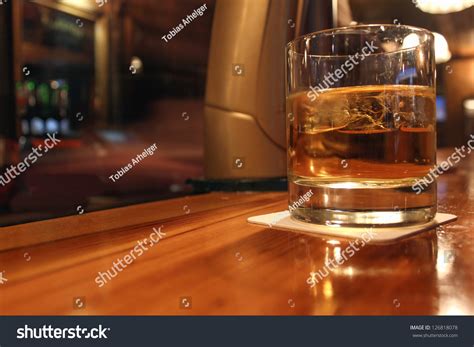 How is whiskey served