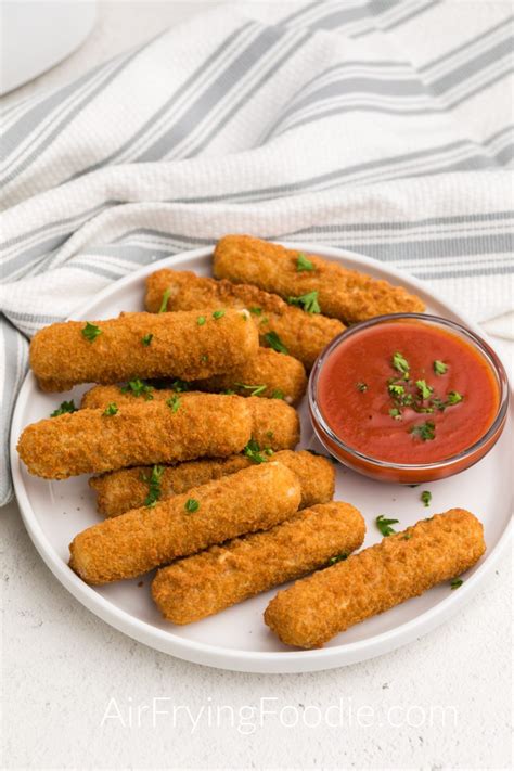 How long do you deep fry frozen cheese sticks?