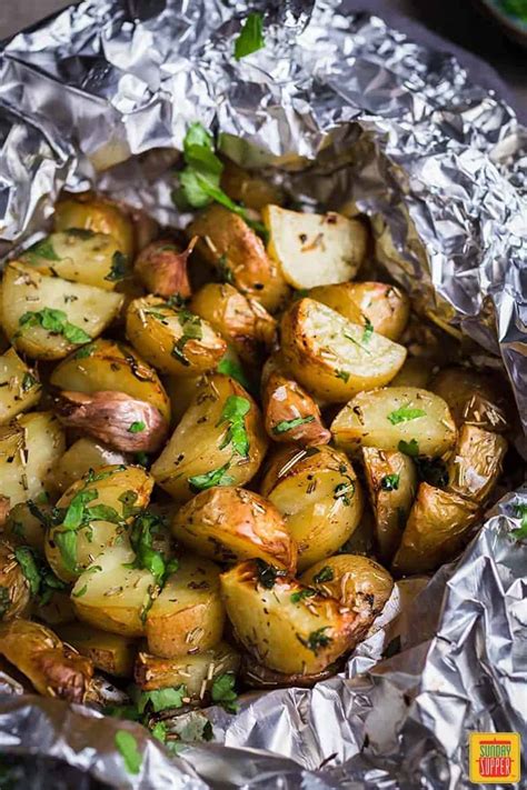 How long to grill potatoes in foil. Step one – cut your potatoes into cubes. Step two – Place potatoes in a foil boat, drizzle with oil, sprinkle with salt & pepper, and place a dollop of ghee or butter on top. Step three – place a piece of foil on top and squeeze tightly around the edge to seal. Step four – place on the grill (sealed) for about 15 minutes. 