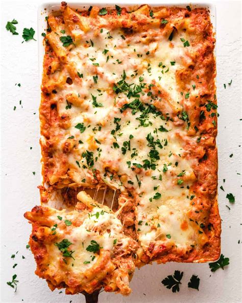 Preheat your oven to 350°F. Add some marinara sauce to moisten your baked ziti, and s prinkle some parmesan, provolone, or Pecorino cheese on top . Cover your casserole or baking dish with aluminum foil and reheat the baked ziti for about 30 minutes. Extend the time to 45 minutes if you have frozen baked ziti .