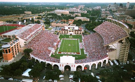 How many does memorial stadium hold. The north end zone was enclosed in two stages from 1965 to 1966, bringing the stadium's capacity to 64,170. A press box was added in 1967 and the south end zone was expanded further in 1972, raising capacity to 73,650. 1973 aerial image of Memorial Stadium 