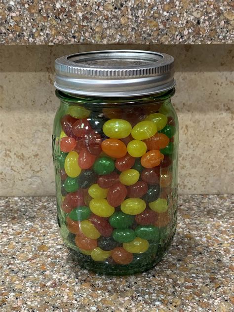 Sep 1, 2022 · A standard jelly bean bag contains about 400 grams and is 16 ounces in volume. Those measurements are important to understand how many jelly beans you can fit into a mason jar. Each jelly bean in a jar is approximately 2cm in diameter by 0.75″ in depth. As a result, each jelly bean weighs about 1 gram, which means that there are 378 jelly ... . 