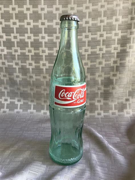 New Listing Vintage 1972 Green 6 1/2 FL OZ Coke Bottle Jennings LA. $10.00. $9.00 shipping. c.1800s Empty Antique PHARMACEUTICAL COCA (Cocaine) Cola GREEN GLASS BOTTLE RARE. $500.00. ... New Listing Coca Cola Columbia SC 1989 Repro Unopened Bottle 6.5oz - Patent Dec 25, 1923. $18.67. or Best Offer.
