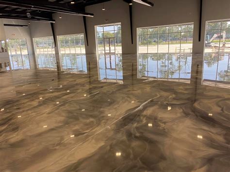 How much does epoxy flooring cost. Epoxy floor cost ranges from $4.80 to $8.00 per square foot. Epoxy garage floor costs approximately $1,200 to $2,000 for a 1-car garage (250-sf garage). 
