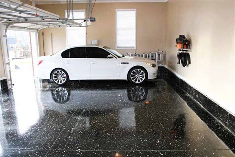 How much does it cost to epoxy 2 car garage. These parital chip floors include about 10 pounds of chips for every two car garage and has a price tag of about $4-$5 per square foot. The next type of Heavy ... 