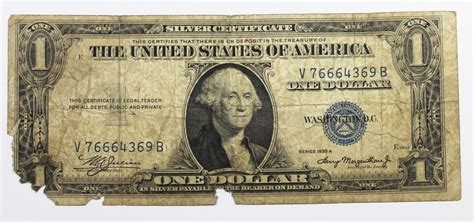 The Series of 1935 $1 Silver Certificates was America's last bank note without the motto "In God We Trust." When the design change was made with the addition of the motto on the back, the series date was changed to the Series of 1957. However, a small number of Series of 1935 notes were made in 1961 with the motto.. 