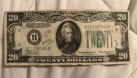 The $20 note features subtle background colors of green and peach. The $20 note includes an embedded security thread that glows green when illuminated by UV light. When held to light, a portrait watermark of President Jackson is visible from both sides of the note.The note includes a color-shifting numeral 20 in the lower right corner of the .... 