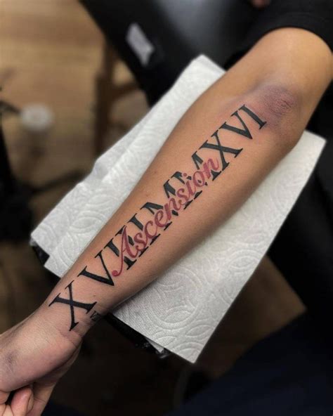 How much is a roman numeral tattoo. A simple Roman numeral tattoo is probably going to run anywhere from $50 to $100 for even the smallest of applications. Many shops often charge a minimum for any work no matter how fast and simple, so even a very basic Roman numeral tattoo will fall in that range. The more you add on, the more you can expect to pay. 