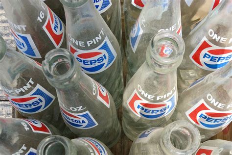 CHECK OUT: 5 Most Valuable Antique Bottles Worth Serious Money. 1929 Pepsi Bottle Cap. Are Old Pepsi and Coke Bottles Worth Anything Bottle Condition 4. If the ACL on the bottle has the words Pepsi and Cola separated by a hyphen, along with the term 2 Full Glasses on the neck, then this version is manufactured after 1950, and is called the Dash ...