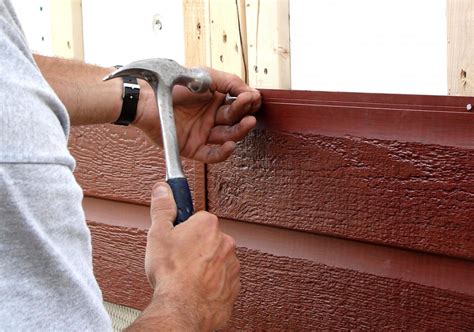 How much is vinyl siding. Install the bottom J-channel so it extends past the side casing about the width of the J-channel face. Cut a 3/4-inch notch in the back of each end, install it and bend the tab. 10. Start ... 