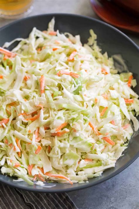 How much slaw for 50. This American classic southern-style coleslaw has it all: fresh, crunchy green cabbage, shredded carrots, and a homemade coleslaw dressing with mayonnaise and apple cider vinegar. This easy coleslaw recipe pairs well with just about any entrée, especially BBQ, grilled meat, and fried seafood. 