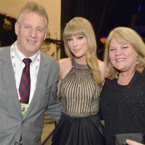 Taylor Swift's parents, Andrea and Scott Swift, are said to have been separated since 2010, but they kept their marital issues private to spare their daughter. ... Scott also continued his age-old tradition of handing out guitar picks for the Eras Tour. Meanwhile, Andrea is happy to snap pictures with Swifties. ...