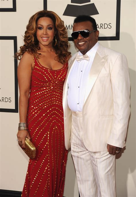 Ronald Isley and his 44-year-old wife, Kandy Isley, were the perfect couple as they posed in matching outfits on the occasion of the former's 80th birthday celebration. Ronald Isley is an American songwriter, recording artist, record producer, and actor. He's famous for being a founding member and lead singer of the family music group, "The. 