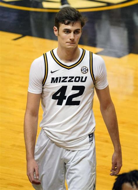 Committing to play basketball for the University of Kansas on Sept. 17, 2018, BVNW alum Christian Braun officially split the Braun household. With his older brother, Parker Braun already committed and redshirting at the University of Missouri, the Brauns had an athlete at each rival school. Upon hearing the news, Parker immediately thought of getting.... 