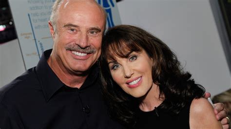 How old is phil and robin mcgraw