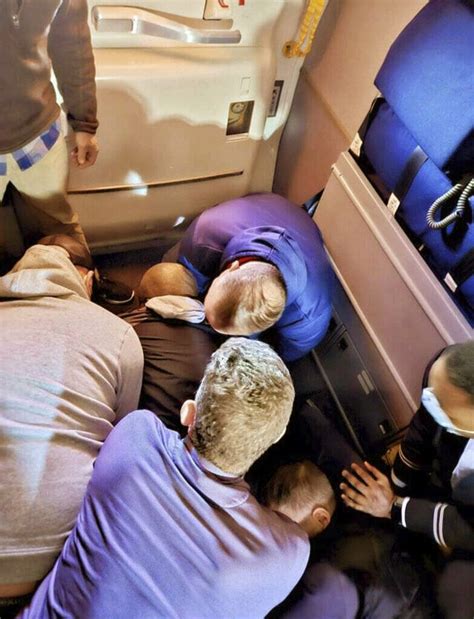 How passengers teamed up to restrain man on chaotic flight