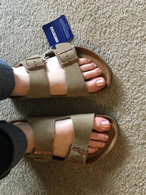 How should birkenstocks fit. Jun 8, 2022 ... You should also allow for about a thumb's width of space between your toes and the end of the sandal. Keep in mind that the footbeds will ... 