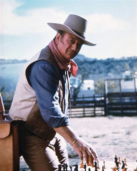 How tall is john wayne in feet