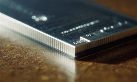 How thick is a quarter in inches