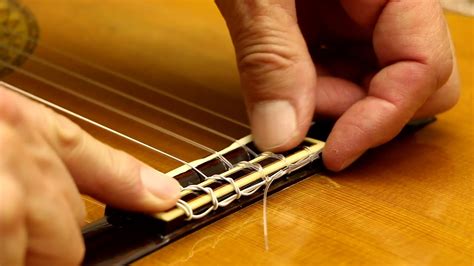 How to Change Nylon Strings on a Classical Guitar - YouTube