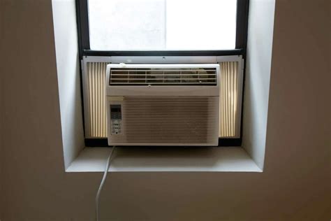 How to Decorate a Window Air Conditioner With Drapery