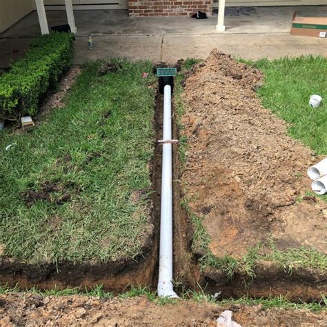 How to Install Catch Basins Create a Landscape Drainage System that