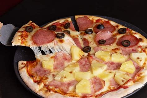How to Prevent Pizza from Sticking to Tray HowdyKitchen