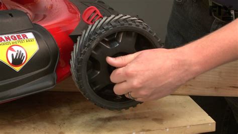 How to Unlock the Front Wheels on a Troy-Bilt Push Mower