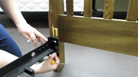 Some headboards will come with extra screws and a wall adapter, others will not. 3Line up the headboard against the wall. Make sure both legs are sitting firmly on the ground and that the headboard is level against the ground and flush against the wall. 4Screw the headboard into the wall using a drill. 5Move your adjustable bed into place.. 