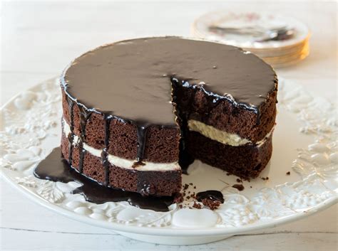 When the cake comes out of the oven, let it cool on a cooling rack for an hour or two. Then, flip the cake out onto a piece of plastic wrap. Wrap the cake tightly in plastic and place it in the fridge overnight. In the morning, you will have a perfectly cooled cake with a texture that dreams are made of.. 