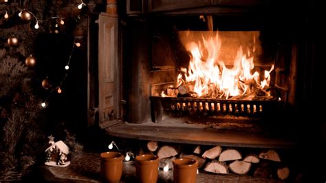 How to build a fire in a fireplace and is it wrong to use newspaper