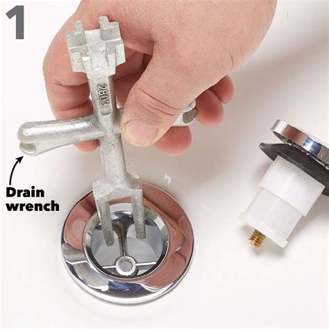 How to change a bathroom drain. Wiggle the handle and pull it off. You may need a faucet handle puller if the handle will not come off by hand. Place a socket wrench over the bathtub faucet stem until it covers the hex nut. Turn the wrench counterclockwise to loosen the nut until you can pull the stem free. Repeat the steps if you have a two-handle system. 