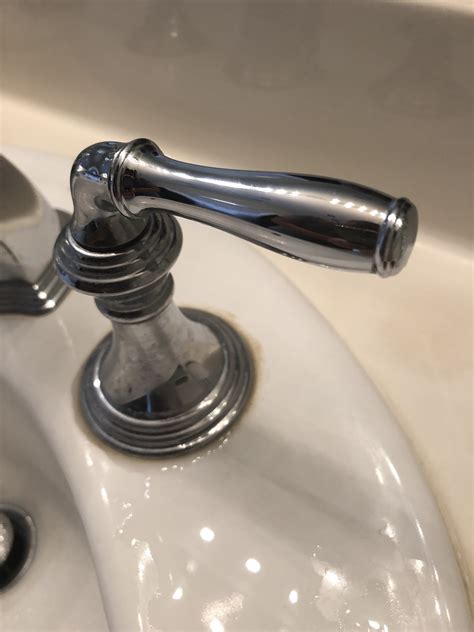 To fix this issue: Turn off the water to your Kohler touchless faucet at the shutoff valves under the sink. Remove the handle to access the valve/cartridge. Using a 3/32″ Hex wrench loosen the Hex screw in the handle and pull out the handle. Unscrew the bonnet cover and then unscrew the mounting nut.. 