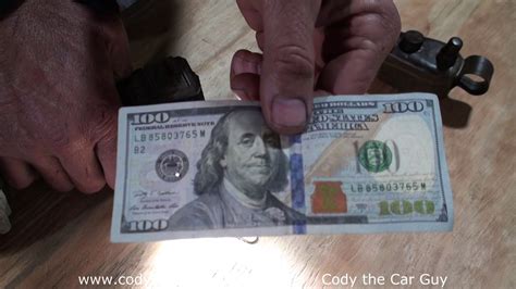 Decoding the $100: Feel, Tilt, Check. It only takes a few simple steps to check the security features and know the note you are handling is genuine U.S. currency. To check the security features in the $100 note, feel the paper, tilt the note, and check with light.. 