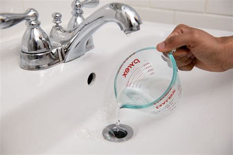How to clean bathroom drain. Sep 28, 2023 · Allow it to soak for at least 10 minutes in water with 2 teaspoons of chlorine bleach. Clear the drain. Mix 1/2 cup of liquid chlorine bleach in 2 cups of hot water. Pour the solution down the drain and let it sit for at least one hour. Flush the drain. Pour more hot water down the drain. 